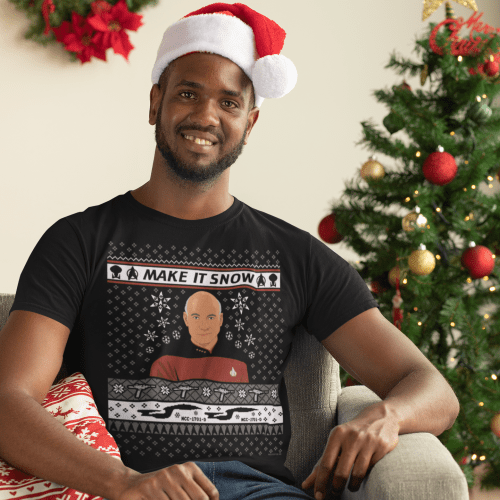 mockup of a man with a crewneck t shirt sitting next to a christmas tree 30344