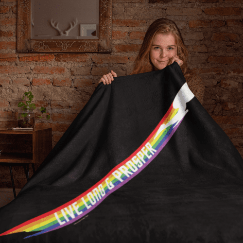 throw blanket mockup featuring a girl sitting on a bed 24677 1